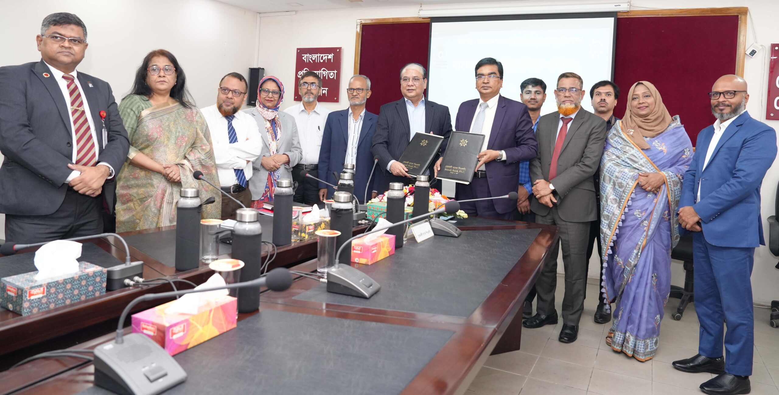 অনলাইনে অভিযোগ দায়ের ফি আদায়ে প্রতিযোগিতা কমিশনের সাথে সোনালী ব্যাংকের চুক্তি